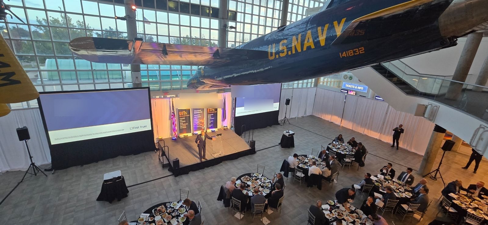 Evening general session beneath a Blue Angels jet, Cradle of Aviation Museum, Long Island